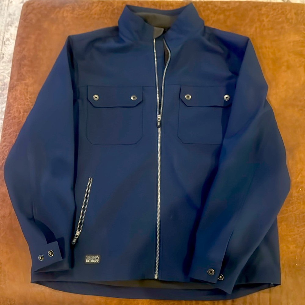 Dri-Duck wind proof shell. Great condition water resistant coat. Navy blue xl.